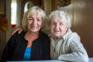 Nursing home patient with woman